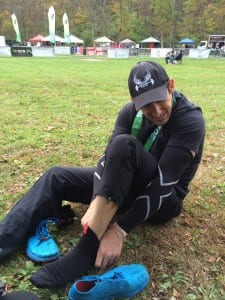 Putting on compression socks and sleeves between the individual and team day of the OCRWC.  