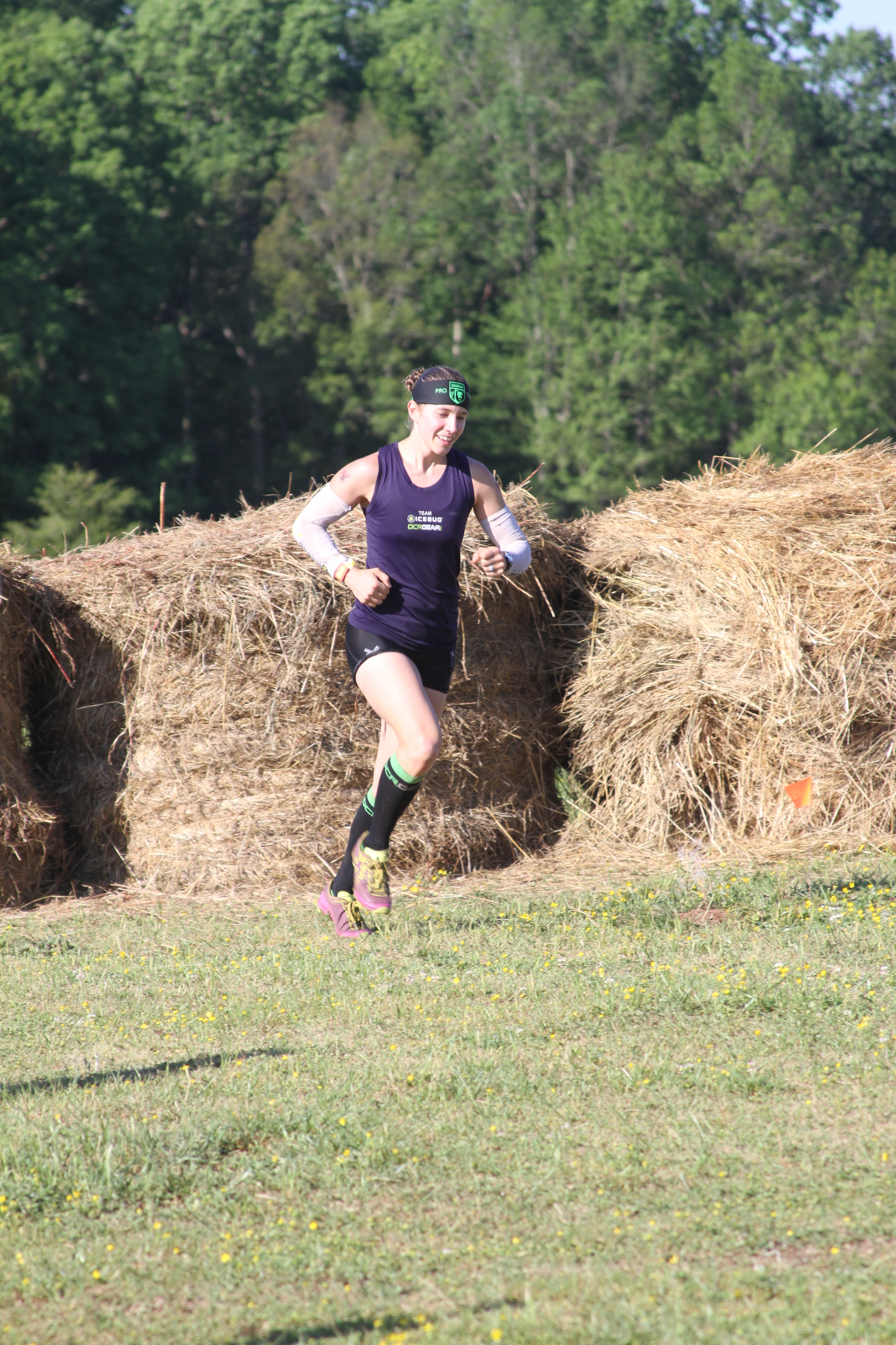 CTG Pro Team Member Amy "Magic" Pajcic clearing hay bales on her way to 3rd spot on the podium.