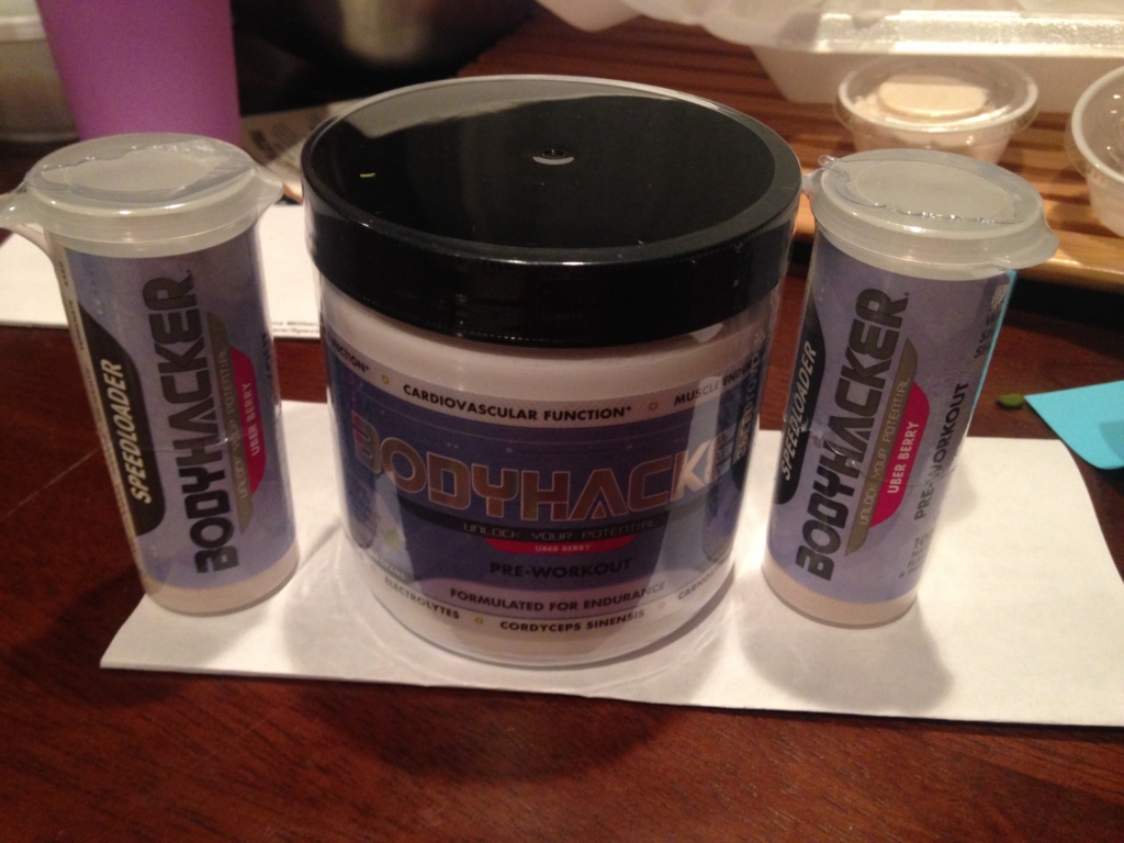 Full size container of Bodyhacker with two speed loaders. Each speed loader has one serving allowing you to drink your pre-workout on the go quickly when traveling, pre-race or headed to the gym. 